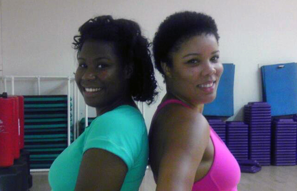 Youth Villages Mentor Melanie (right) takes a break from Zumba with her mentee, Melissa